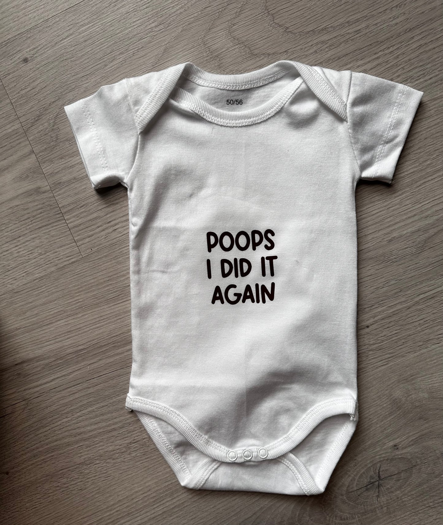 Romper tekst - poops i did it again