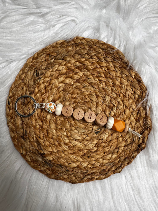 Naamsleutelhanger orange flower