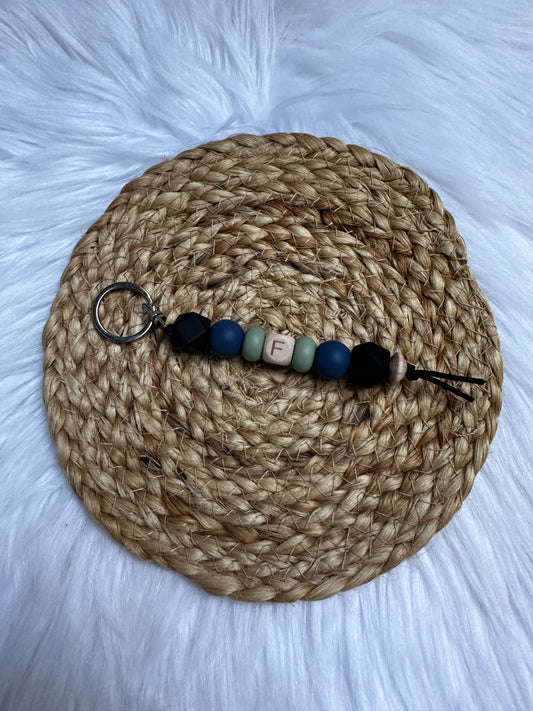 Lettersleutelhanger donkere tinten