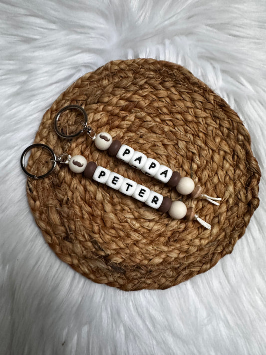 Naamsleutelhanger snor bruin